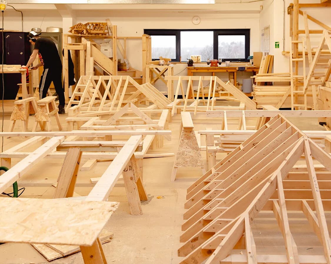 Timber roof structures being assembled in a joinery workshop